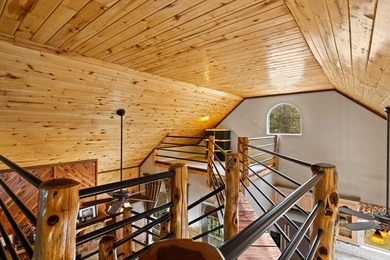 Perched on a scenic hilltop overlooking one of the Twin Lakes - photo 22