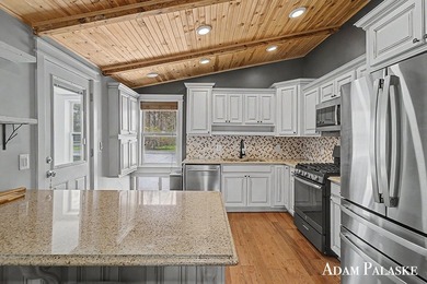 Welcome to Gun Lake living just in time for summer! This 4 bed 3 - photo 4