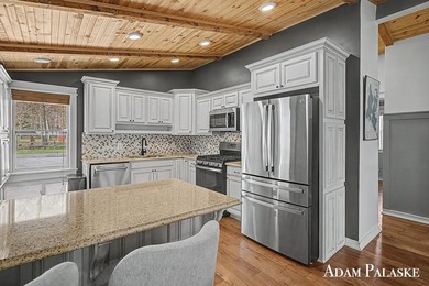 Welcome to Gun Lake living just in time for summer! This 4 bed 3 - photo 5