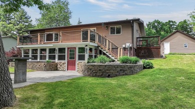 Lakefront Living on Tainter Lake. Discover this beautifully - photo 15