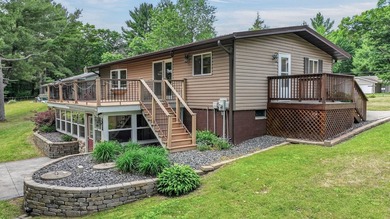 Lakefront Living on Tainter Lake. Discover this beautifully - photo 17