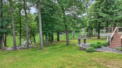 Lakefront Living on Tainter Lake. Discover this beautifully - photo 18