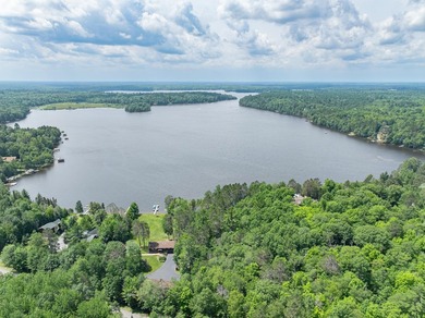 LEVEL and SANDY frontage on Scattering Rice Lake!-This 8 bed, 3 - photo 2