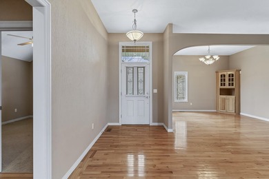 This beautiful all brick home featuring a 3 car garage and