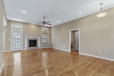 This beautiful all brick home featuring a 3 car garage and