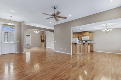 This beautiful all brick home featuring a 3 car garage and