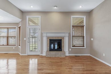 This beautiful all brick home featuring a 3 car garage and