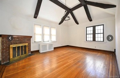 Opportunity is knocking with this legal 8-family Tudor in the - photo 15
