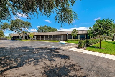Free standing on a large corner lot commercial building - photo 1