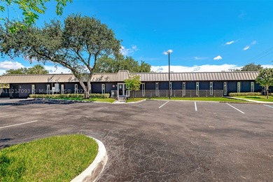 Free standing on a large corner lot commercial building - photo 3