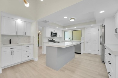 An exceptionally remodeled 2 bedroom 2 bathroom villa in the - photo 1
