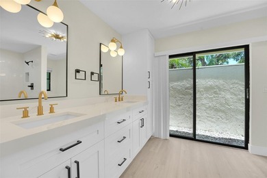 An exceptionally remodeled 2 bedroom 2 bathroom villa in the - photo 7