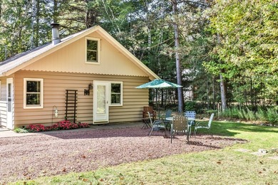 Tucked along the shores of beautiful Rest Lake on the coveted - photo 5