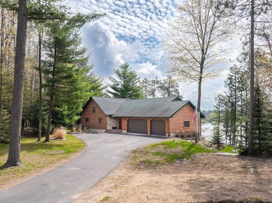 Rare 222' of sandy frontage on Scattering Rice Lake on the - photo 7