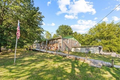 Fixer upper and almost 10 acres with plenty of potential to - photo 1