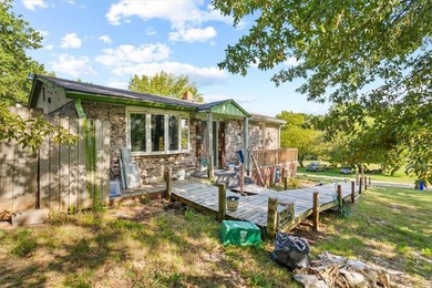 Fixer upper and almost 10 acres with plenty of potential to - photo 2