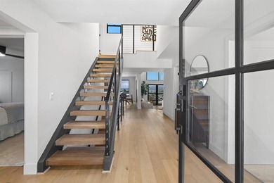 Commandingly perched in coveted Bay Park, this extraordinary - photo 7