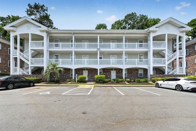 Move-in ready, two-bedroom, two-bathroom end-unit condo with - photo 1