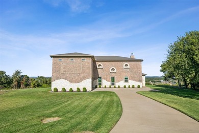 Welcome to this beautiful custom built home nestled atop the - photo 1