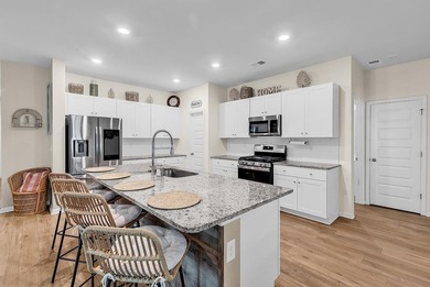 Welcome home to Coastal Charm at the Beach, a beautifully - photo 10