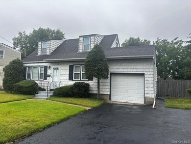 Copiague South Dormered Cape with Garage & Full Basement with - photo 1