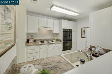 This beautifully updated first-floor Rosedown model in The