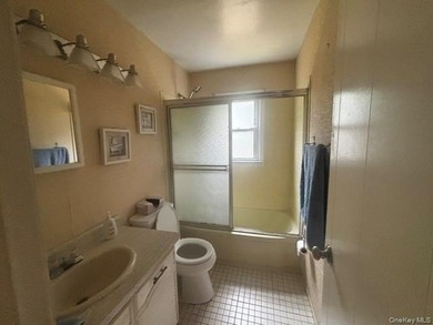 Copiague South Dormered Cape with Garage & Full Basement with - photo 7