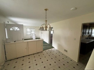 Copiague South Dormered Cape with Garage & Full Basement with - photo 9