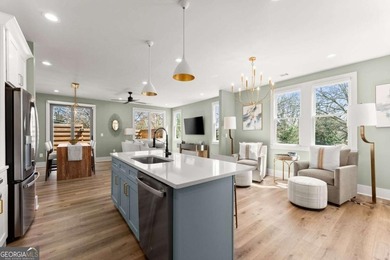 Rare primary-on-main townhome with a two-car garage just steps - photo 11