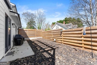 Rare primary-on-main townhome with a two-car garage just steps - photo 12