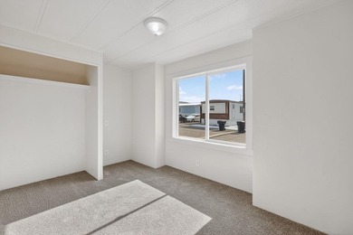 This recently remodeled 3 Bedroom, 2 Bath manufactured home is - photo 13