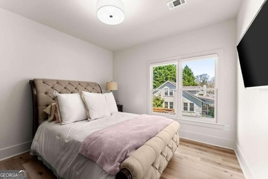 Rare primary-on-main townhome with a two-car garage just steps - photo 25