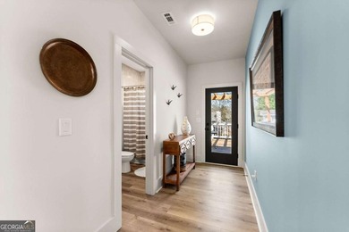 Rare primary-on-main townhome with a two-car garage just steps - photo 28