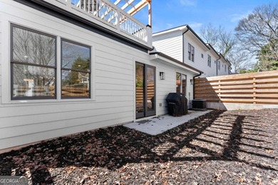 Rare primary-on-main townhome with a two-car garage just steps - photo 32