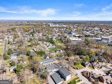 Rare primary-on-main townhome with a two-car garage just steps - photo 38