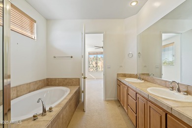 Within a Gated Community, built within the boulders, capturing