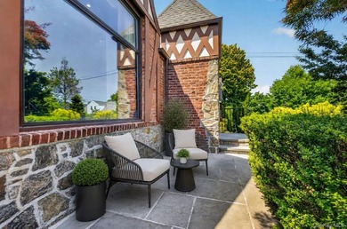 Where classic charm meets modern living. Set behind a - photo 1
