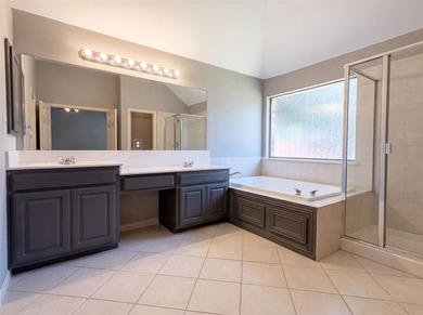 Welcome to 2601 Whispering Trl, a home that exudes warmth and - photo 12