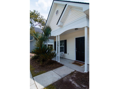 UPDATED PHOTOS! This adorable garden home has been completely - photo 1