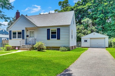 Charming 4-bedroom, 1-bath Cape located mid-block on a quiet - photo 1
