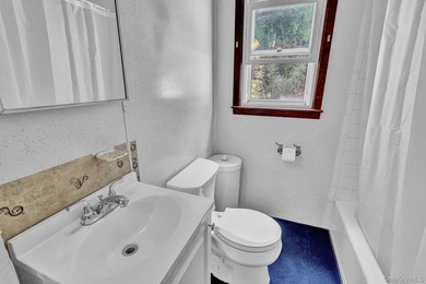 Charming 4-bedroom, 1-bath Cape located mid-block on a quiet - photo 8