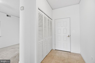 GREAT NEW PRICE on this freshly painted top floor unit with - photo 8