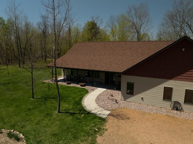 Amazing custom built home on 40 wooded acres near White Lake in - photo 7