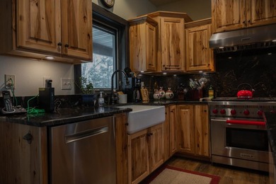 Amazing custom built home on 40 wooded acres near White Lake in - photo 10