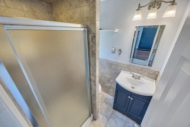 This Beautiful Well Maintained Home Perfectly Landscaped Front & - photo 31