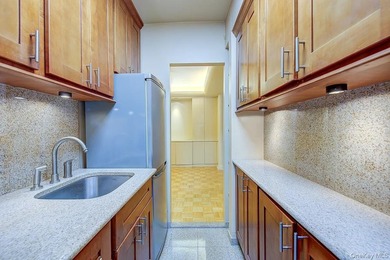 THE UNIT: A private, hidden gem in a coveted building and