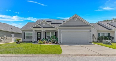 Welcome to this well-maintained 3-bedroom, 2-bath home located - photo 1