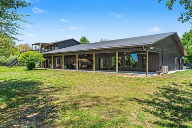 PRICE REDUCED! Exceptional lakefront retreat on nearly 5 private - photo 13