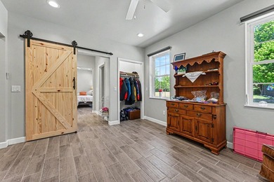 PRICE REDUCED! Exceptional lakefront retreat on nearly 5 private - photo 32