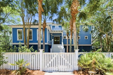 Surrounded by mature live oaks and set on more than half an acre - photo 2
